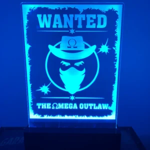 A wanted poster is shown in the light.