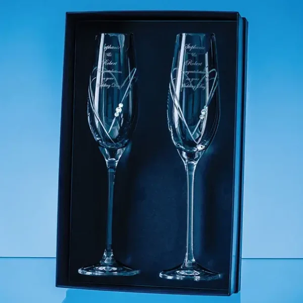 A pair of champagne flutes in a gift box