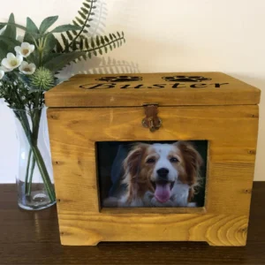 A wooden box with a picture of a dog in it.