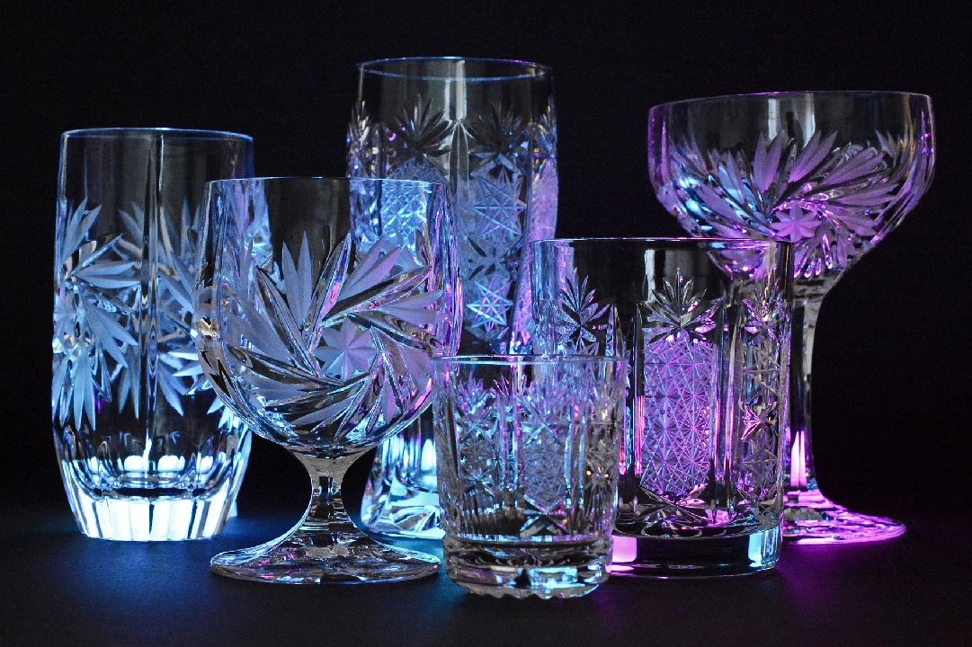 A group of glasses sitting on top of a table.